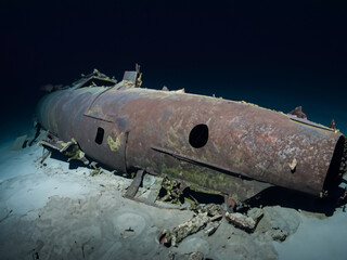 Fototapeta premium wreckage of sunken submarine at the bottom of the sea