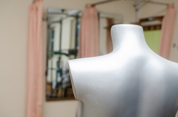 Silver female mannequin in the store