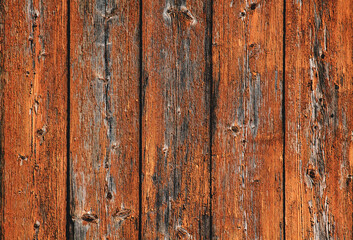 Wooden background boards. Old wooden fence painted in orange background. Backgrounds and texture concept
