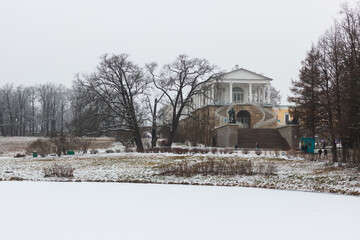 Snow-covered Alexander Park in Pushkin in autumn.