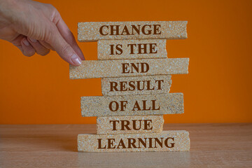 Concept words Change is the end result of all true learning on brick blocks. Beautiful orange...