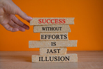 Concept words Success without efforts is just illusion on brick blocks on a beautiful wooden table,...