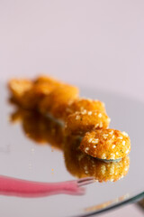 Crispy potato balls served at the buffet of a wedding banquet