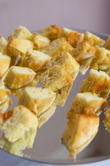 Slices of focaccia served at the buffet of a wedding banquet.