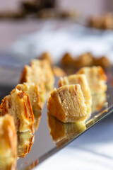 Slices of focaccia served at the buffet of a wedding banquet.