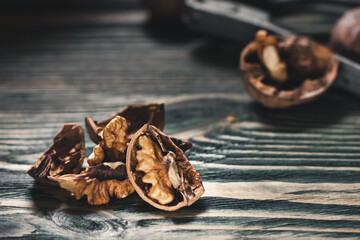 Cracking walnut shells process. Walnut kernel.