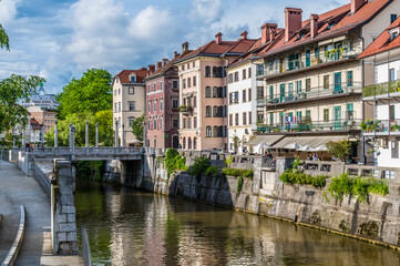 Fototapeta na wymiar A view towards the Shoemakers bridge from the New Square in Ljubljana, Slovenia in summertime