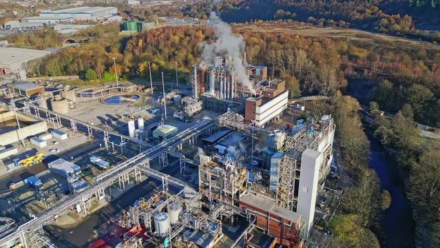 Aerial cinematic footage of a Chemical fertilizer plant producing chemicals for the agricultural industry.