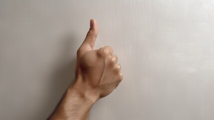 man hand shows thumbs up