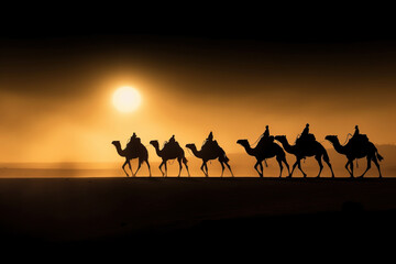 Camel caravan through desert dunes at sunset. Amazing African Wildlife. Generative Ai