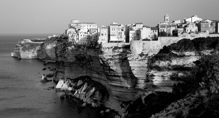 Historic old town of Bonifacio above steep cliffs on the cliff coast of Corsica island is a popular...