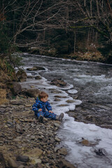 child on the river