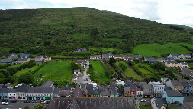 Cahersiveen rural Irish village and green hills in Kerry County. 4K Aerial view