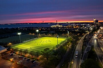 Fototapeta na wymiar Aerial view of Calvert Vaux Park in Brooklyn, New York during a beautiful and colorful sunset