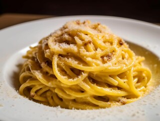 a plate of pasta that is covered with cheese on a table