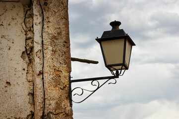 Fototapeta na wymiar Street lamp typical of village