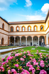 Obraz premium Loggia, or courtyard, of the Elephant, with pool, meadow and colonnade, in the Castello Sforzesco (