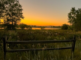 Beautiful sunset over Burlington Lake in northeast Wyoming on a summer evening