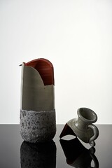 A vertical shot of a broken jar