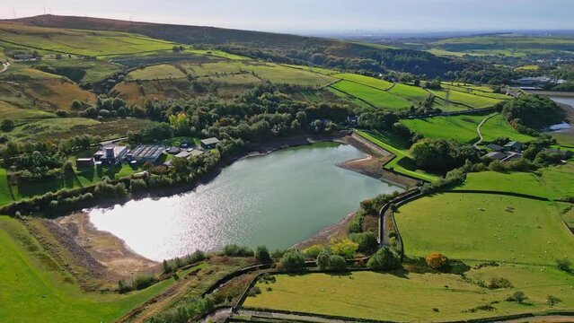8K Video Clip. Cinematic, aerial clip of Ogden Reservoir, Oldham, on the edge of the Pennines.
