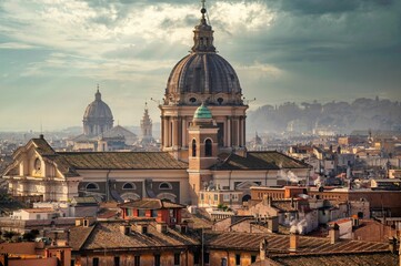 Aerial view of beautiful cityscape of Rome with Sant'Ambrogio e Carlo al Corso Basilica in Italy