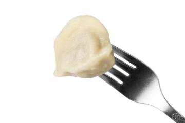 Dumplings pierced on a fork. Dumpling isolated on white background.
