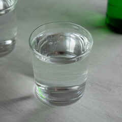 Sparkling Mineral Water in a Glass, side view.