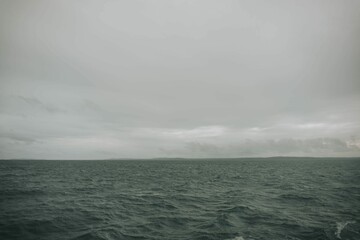 Beautiful view of a peaceful sea under dark storm clouds, Bacolod City, Negros Occidental