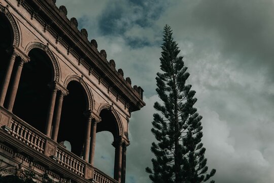 Detailed balcony overlooking picturesque landscape featuring trees, Bacolod City, Negros Occidental