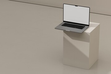 Laptop on beige block