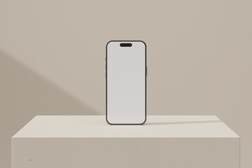 Phone on beige block - obrazy, fototapety, plakaty