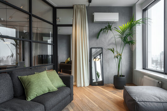 glass partition in stylish apartment with contemporary design