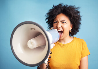 Megaphone, protest and young woman for human rights, racism and equality, freedom of speech, strong...
