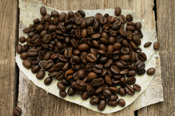 coffee beans on wooden background