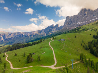 Aerial of a mountainous landscape in the Dolemites. Italian Alps. Drone Landscape Photography. Europe Travel. Hiking Destination.