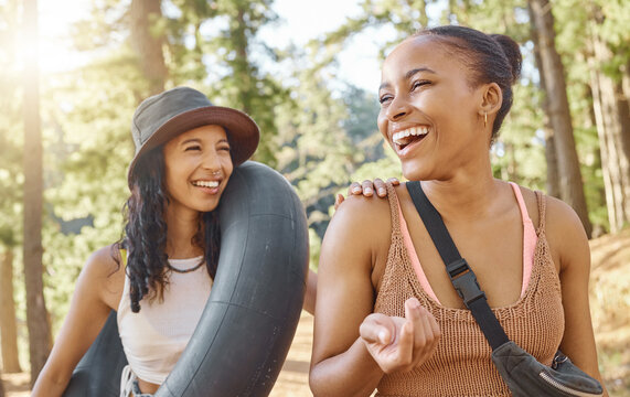 Women friends, camping and smile in woods, sunshine or funny chat on adventure, bonding and freedom on holiday. African girl, together and happy people for summer vacation, forrest and walk in nature