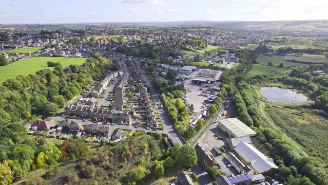 Aerial View of a typical UK town, suburb district sowing housing, gardens and roads.