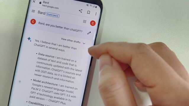 Singapore - June 2023: Asking Google Bard whether chatGPT is better