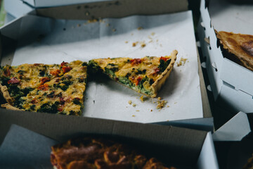 Pieces of delicious vegetable pie in a box