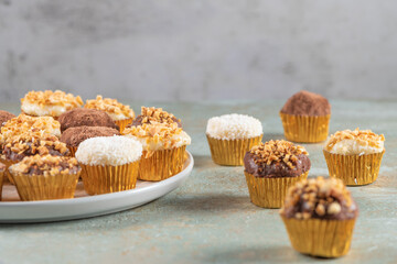 Brigadeiro is a common Brazilian dessert. Delicious chocolate candy Brigadeiro on a table