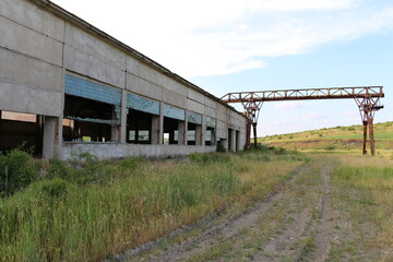 A building with a dirt path