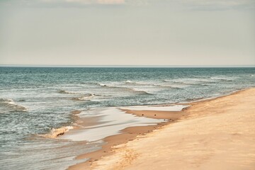 Serene Morning Bliss: Tranquil Baltic Sea Shore Awaits, Embracing the Essence of Vacation