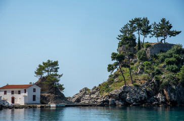 Panagia Island and small church on beautiful beaches of Greece Parga