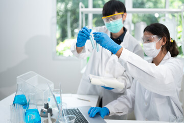 Health care researchers working in life science laboratory, medical science technology research work for test a vaccine, coronavirus covid-19 vaccine protection cure treatment