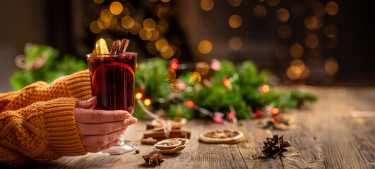 Glass cup with mulled hot wine