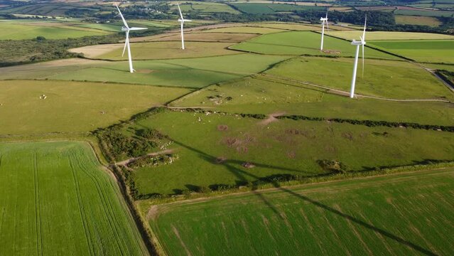 Wind turbines in cornwall england uk from the air drone aerial 