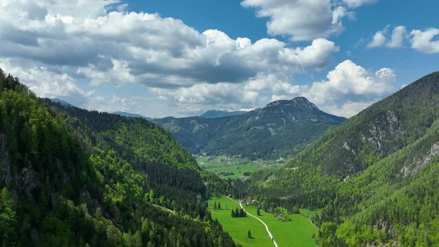 Zgornje Jezersko valley in Slovenia aerial view during a beautiful springtime day with the mountain range around the Grintovec mountain peak in the Kamnik�Savinja Alps.