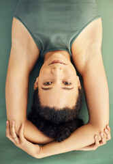 Happy woman, yoga and lying on mat for exercise, stretching body or workout above at home. Top view portrait of female person, face or yogi in warm up or pose for spiritual wellness or awareness