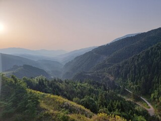 Fototapeta na wymiar sunrise morning mountains back to back in spring morning in metsovo greece