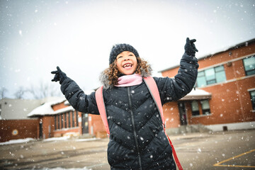 Black child going back to school with a backpack